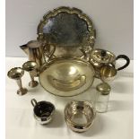 A box of plated ware to include teapot, milk & sugar.