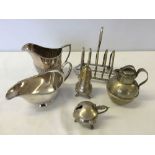 6 silver plated items to include a toast rack.