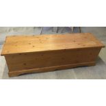 A large pine blanket box, approx 159cm long.