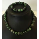 A green agate necklace & bracelet set. Silver clasp to necklace.