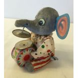 A c1960-70s Japanese wind-up tinplate elephant. 13cm tall.