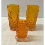 3 Whitefriars tangerine glass bark design vases. 2 x 19cm vases and a 13cm coffin shaped vase.