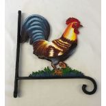 A large cast iron reproduction cockerel hanger.