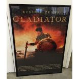 A framed & glazed 'Gladiator' film poster. 100 x 71cm.
