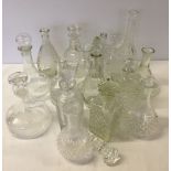 A quantity of glass decanters.