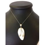 Mother of Pearl pendant set in 925 silver chain.