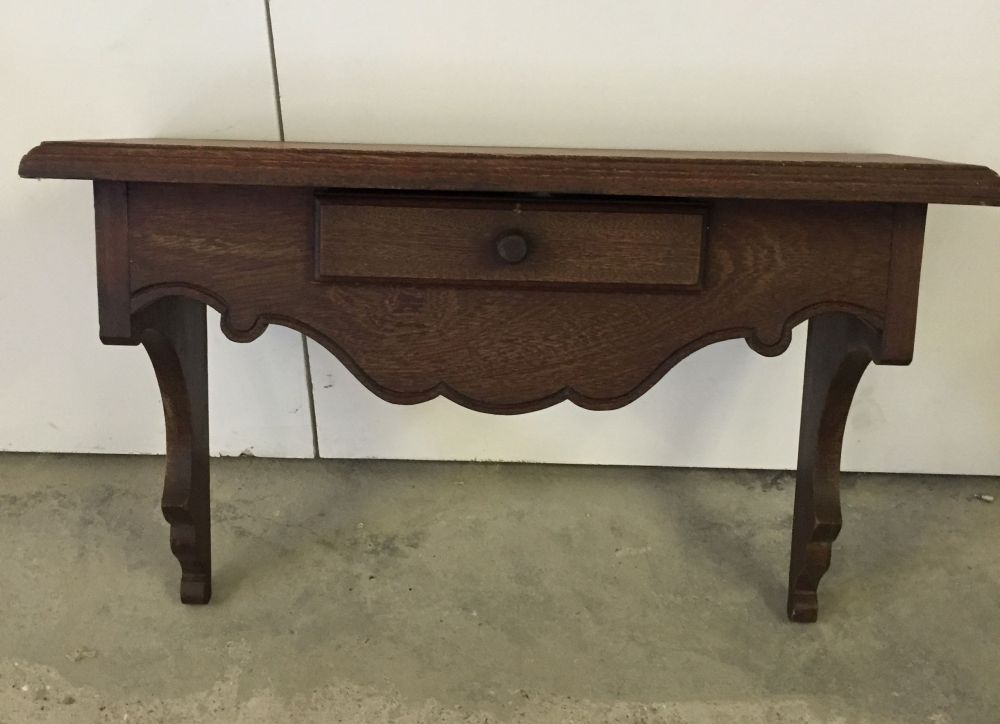 Single drawer dark wood occasional table. 50 x 70 x 29cm.