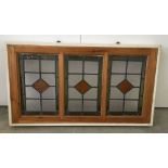 3 vintage lead light windows framed together.