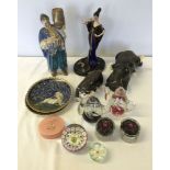 A box of ceramics to include cat figures, together with a box of glassware including paperweights.