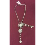 Unusual ornate Rodrigo Otazu designer necklace with crystal set star pendant approx 2.25" across and