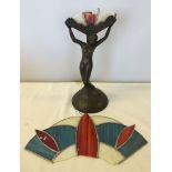 An Art Deco winged lady table lamp, glass shade broken.
