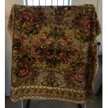 A vintage yellow flower pattern rug. Approx 40 x 70cm.