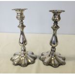 2 silver candlesticks, marks rubbed, believed Mappin & Webb. Filled bases.