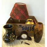 A box of assorted items to include vases, a table lamp, a Metamec clock and a stamp album.
