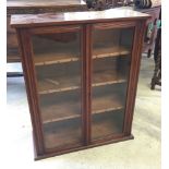 A wooden glass fronted bookcase 2 door & 2 shelves 80cm wide x 96cm tall.