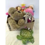 A large box of soft toys.