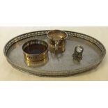 A small quantity of silver plated items to include a tray, coasters and a miniature clock.
