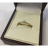 Diamond solitaire ring set in 9ct gold. Size O½.