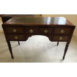 A Victorian mahogany desk with green leather & gilt tooled top. Top 110 x 57cm