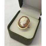 Nicely carved oval cameo of Dionysus Goddess of wine. Set in a hallmarked 9ct gold mount. Size