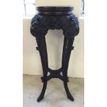 A late 19th/early 20th century Chinese carved wood plant stand. Bird & foliage decoration. 3 feet (