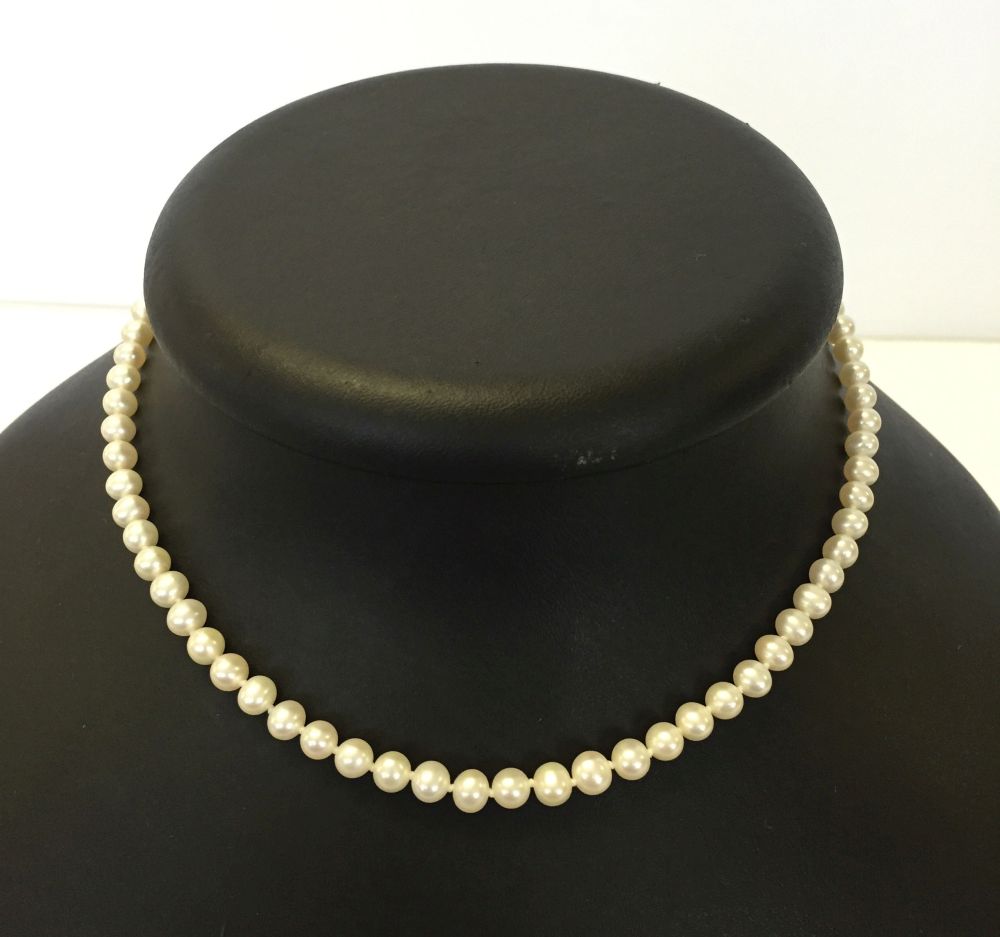 Single string of cultured pearls with a 9ct gold clasp.