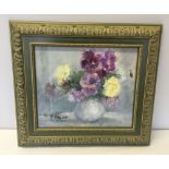 A framed oil on canvas of pansies by Molly Schoop. Canvas size 25 x 30cm.