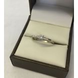 Hallmarked 9ct white gold ring set with approx. 0.2ct solitaire diamond. Size N, weight approx 1.8g.