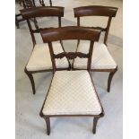 3 Regency mahogany sabre leg chairs. Cane seated with oatmeal cushions.