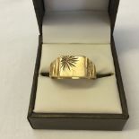 Gents 9ct gold signet ring set with a small diamond and sunray engraving. Size Z, approx weight 5.