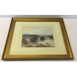 A framed & glazed watercolour by EP Baker of a river scene. Frame size 44 x 54cm.