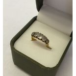 18ct gold ladies ring with Chester 1844 hallmark set with 5 white stones, all very worn. Size O,