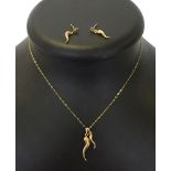 2 gold 'Horn of Plenty' pendants on a chain, together with a matching pair of earrings. Total weight