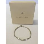 A Dinny Hall designer silver signature tapering triple bar bracelet as new in original box.