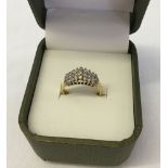 Ladies 18ct gold cathedral set diamond ring with 27 diamonds in rows of 3. Size L.