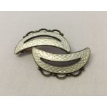 Double crescent Norwegian silver brooch with white guilloche patterned enamel - by Arne Nordlie,