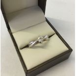 Ladies silver dress ring set with a clear stone, Double shank effect. Size approx Q, total weight