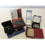 6 boxed costume jewellery sets of different designs.