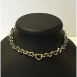 Heavy 925 silver necklace made from heart shaped links. Approx weight 57.6g, length approx 17".