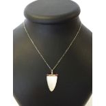 Unusual pendant by designer Donna Chambers made using antique mother of pearl dated from the Ch'