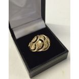 Hallmarked 9ct gold decorative ring. Size P. Approx weight 5.2g.