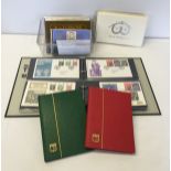 A collection of GB stamps presentation packs commemorative issues 1973 to July 83, FDCs 1968 to 1974