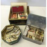 3 tins of loose cigarette cards.