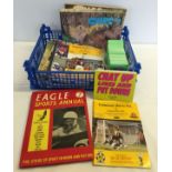 A box of sport related items comprising Cambridge United FC programmes, Match Attax cards, Eagle