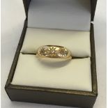 18ct gold ring set with 3 diamonds, size P, approx 3.7g total weight. Hallmark rubbed. Tests as 18ct