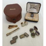 A small collection of cuff links and tie pin to include boxed Wedgwood with a leather stud box.