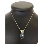 Heavy 925 silver pendant and 16" chain. Pendant set with labradorite stone. Total weight approx