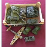A small collection of playworn unboxed diecast Dinky military vehicles.