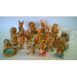 A box of 22 old Pendelfin figures together with a ceramic mug.