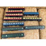 10 unboxed OO gauge Tri-ang, Hornby & Lima coaches in mixed liveries.